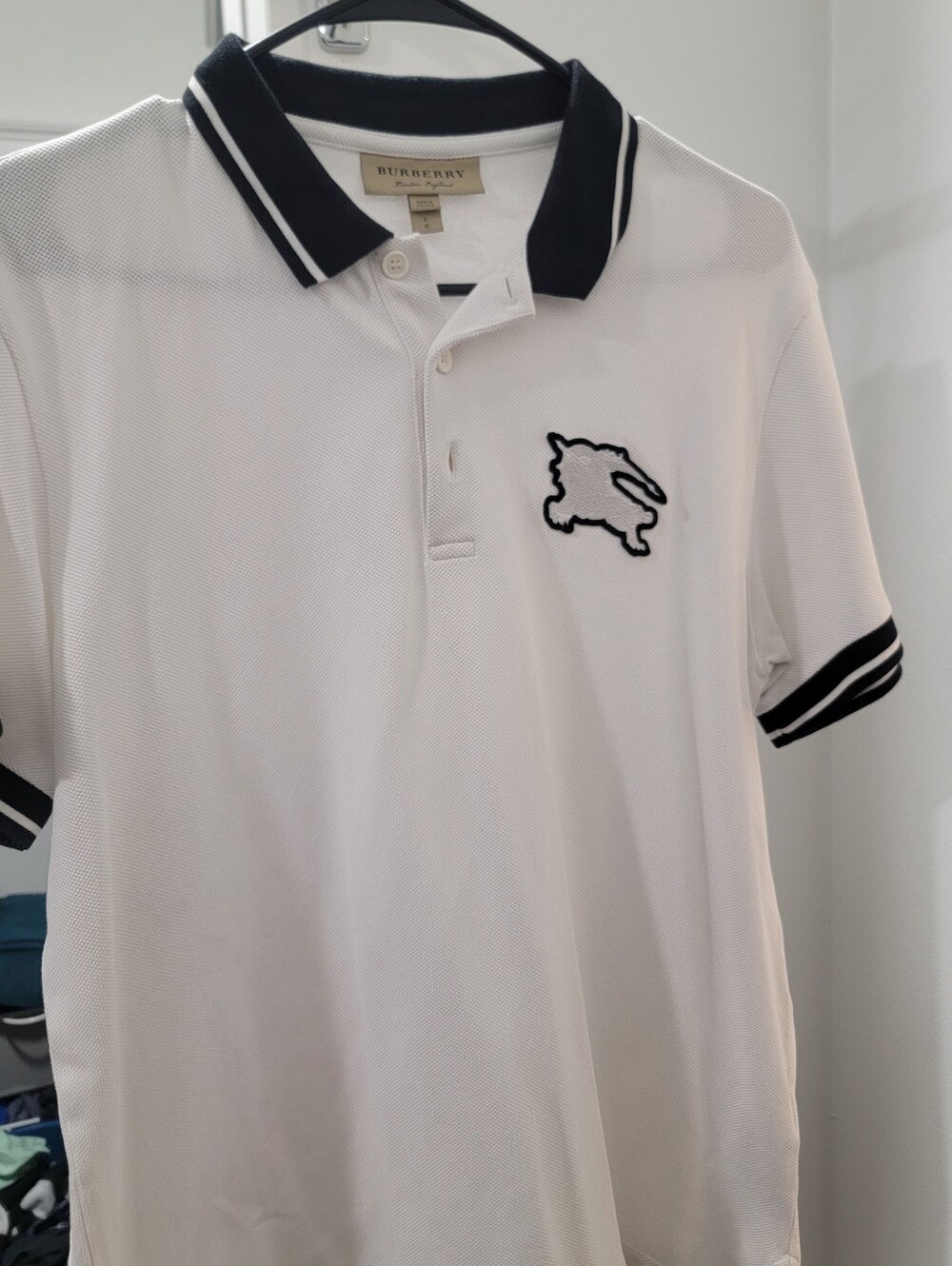 Burberry White Polo with Black Trim and Embroidered Motif